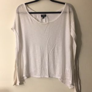 Slightly distressed white open back long sleeve